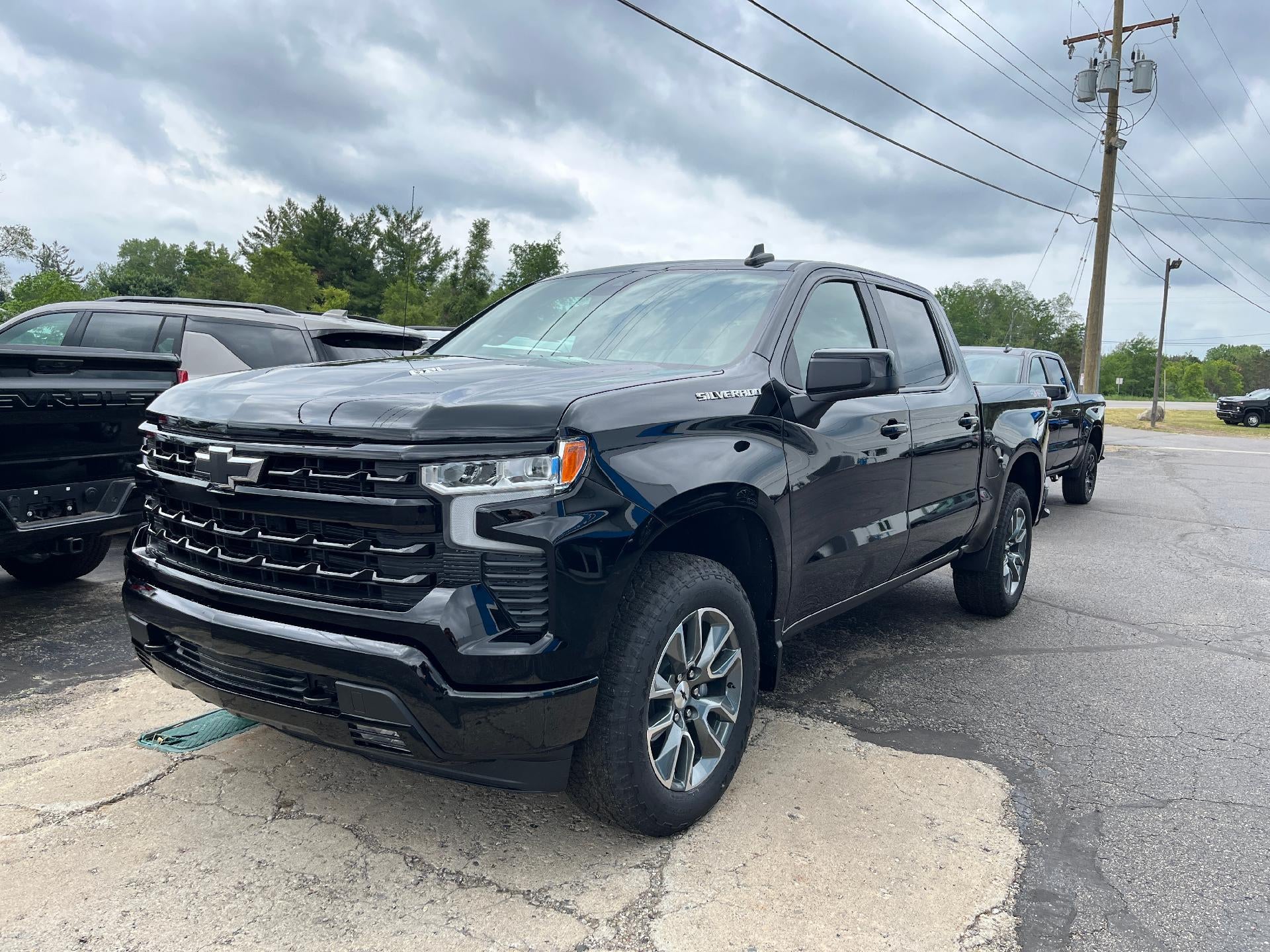 2026 Chevrolet Silverado 1500 RST in Black — front three-quarter view