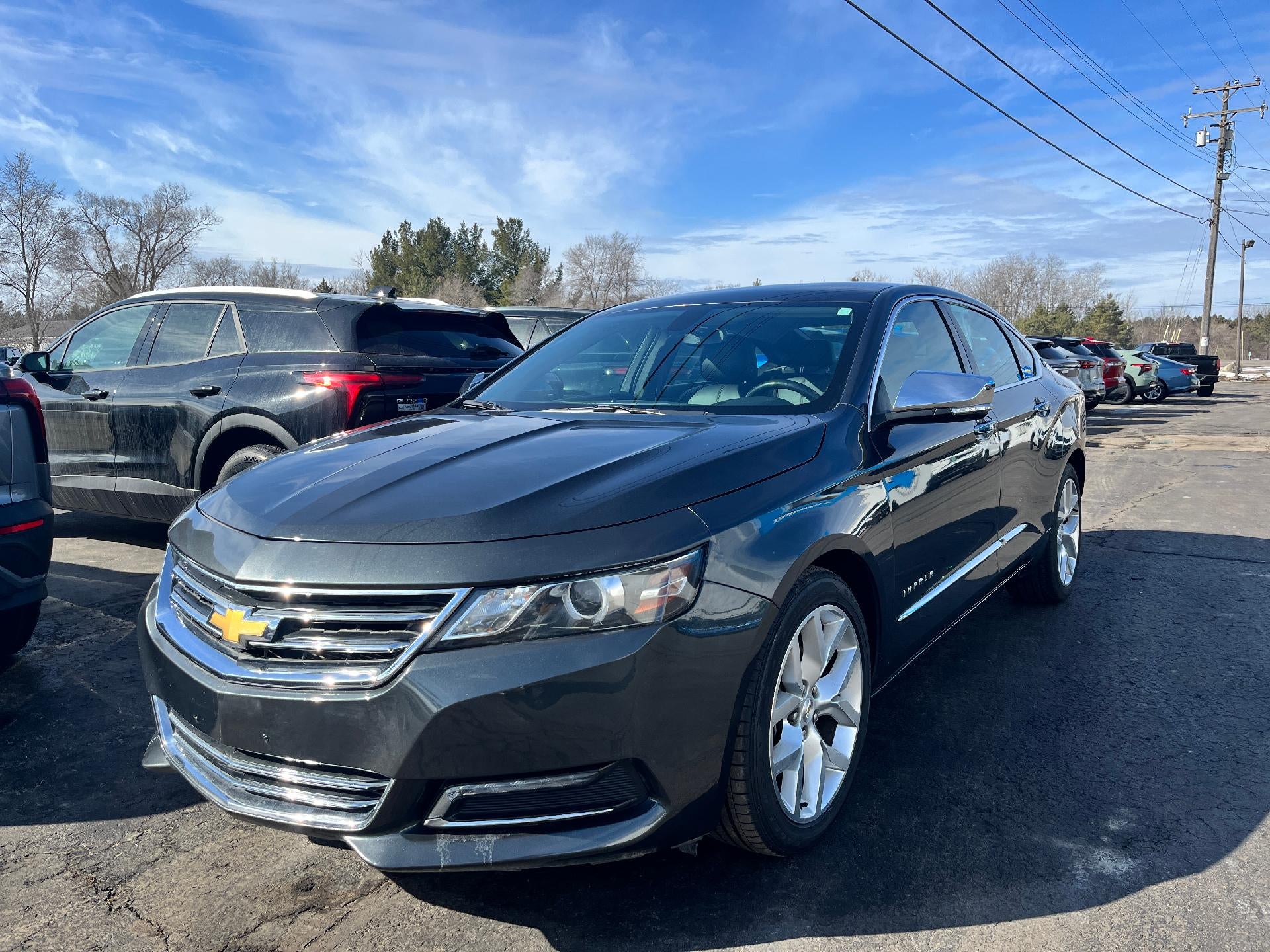 2019 Chevrolet Impala Premier in Nightfall Gray Metallic — front three-quarter view