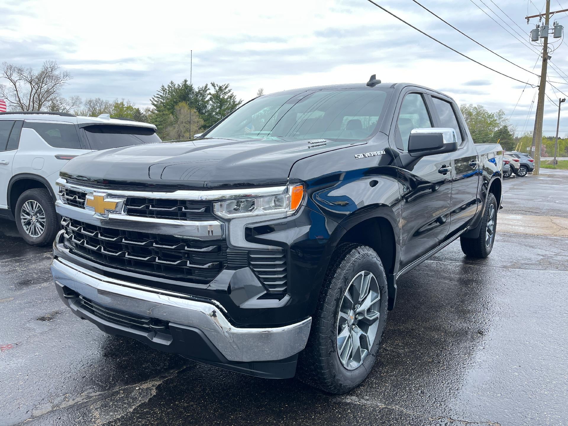 2025 Chevrolet Silverado 1500 LT (2FL) in Black — front three-quarter view