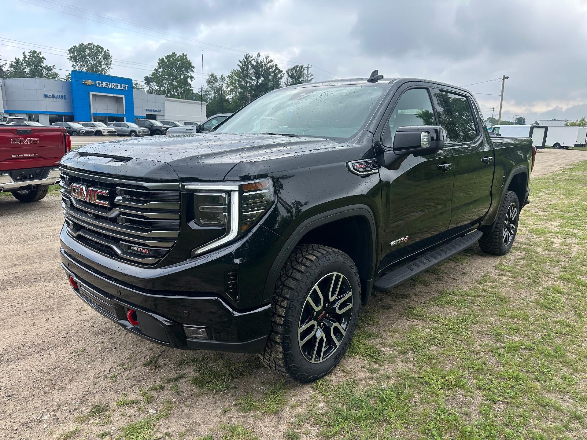2026 GMC Sierra 1500 AT4 in Onyx Black — front three-quarter view