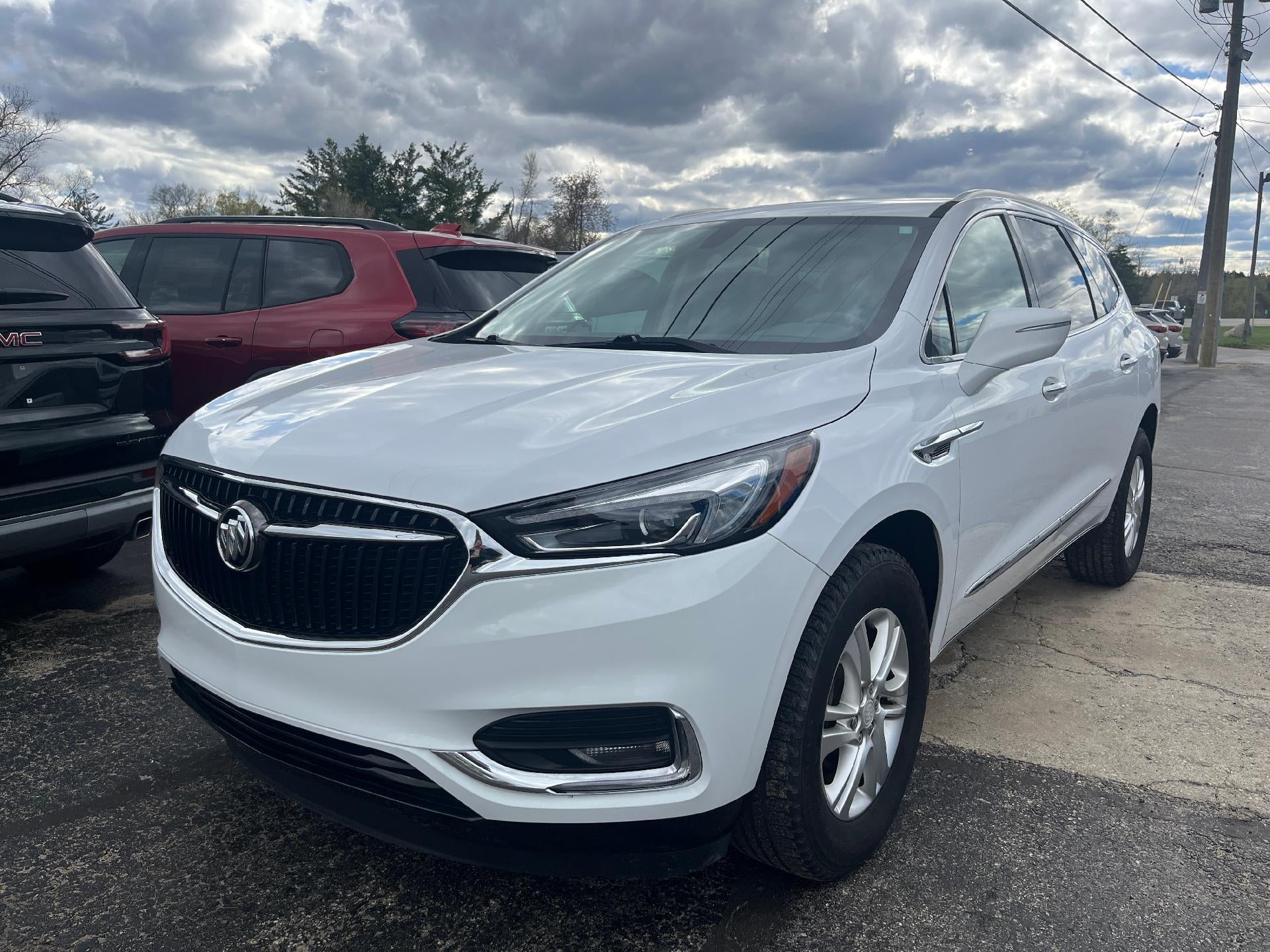 2019 Buick Enclave Essence in (Includes Pitch Dark Night Lower Exterior Accent Color. — front three-quarter view